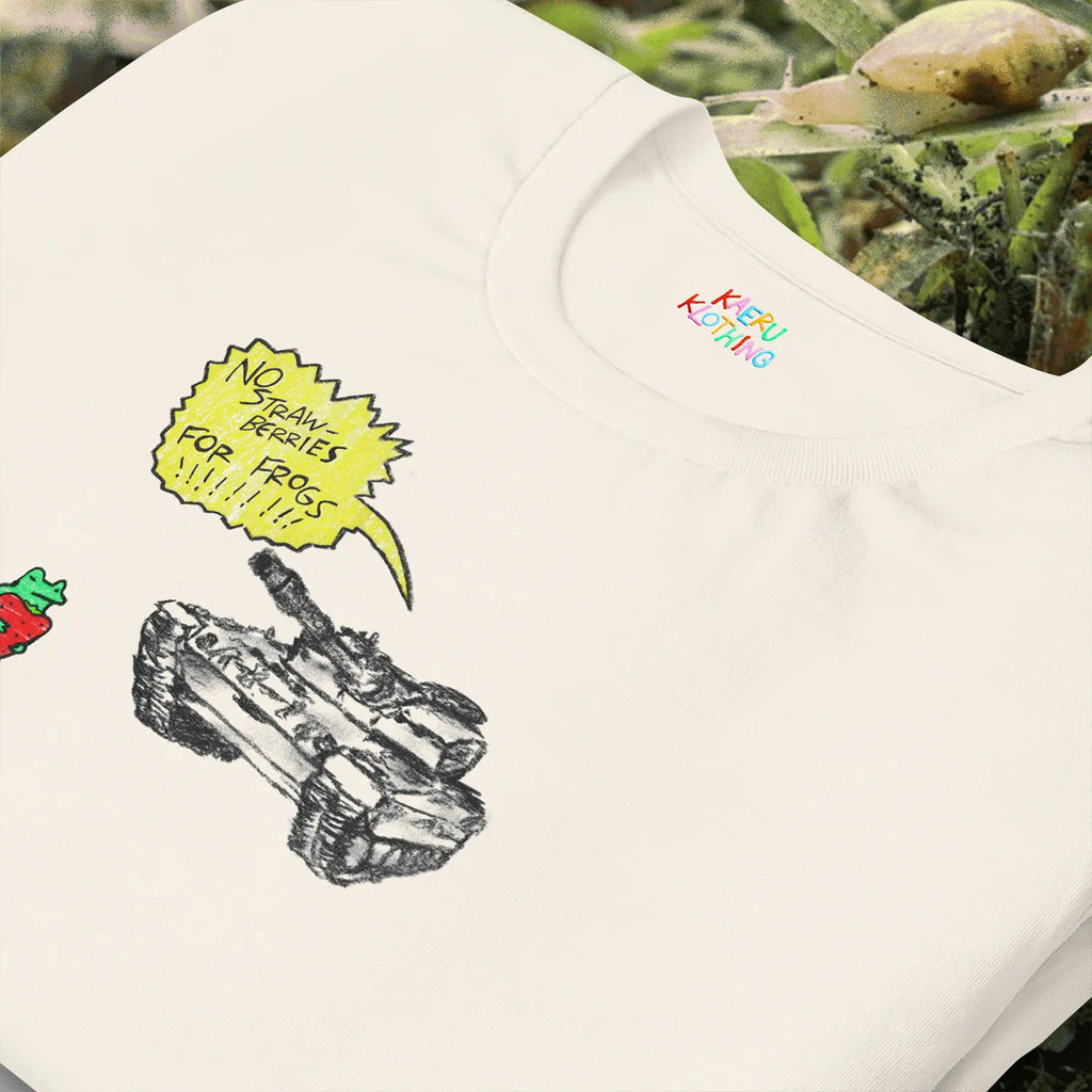 Close-up of TANKRU TEE by Kaeru Klothing — detailed view of the hand-drawn design featuring a frog holding a strawberry and a tank with a yellow speech bubble saying “NO STRAWBERRIES FOR FROGS.”